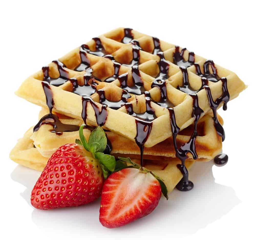 waffles drizzled with chocolate syrup